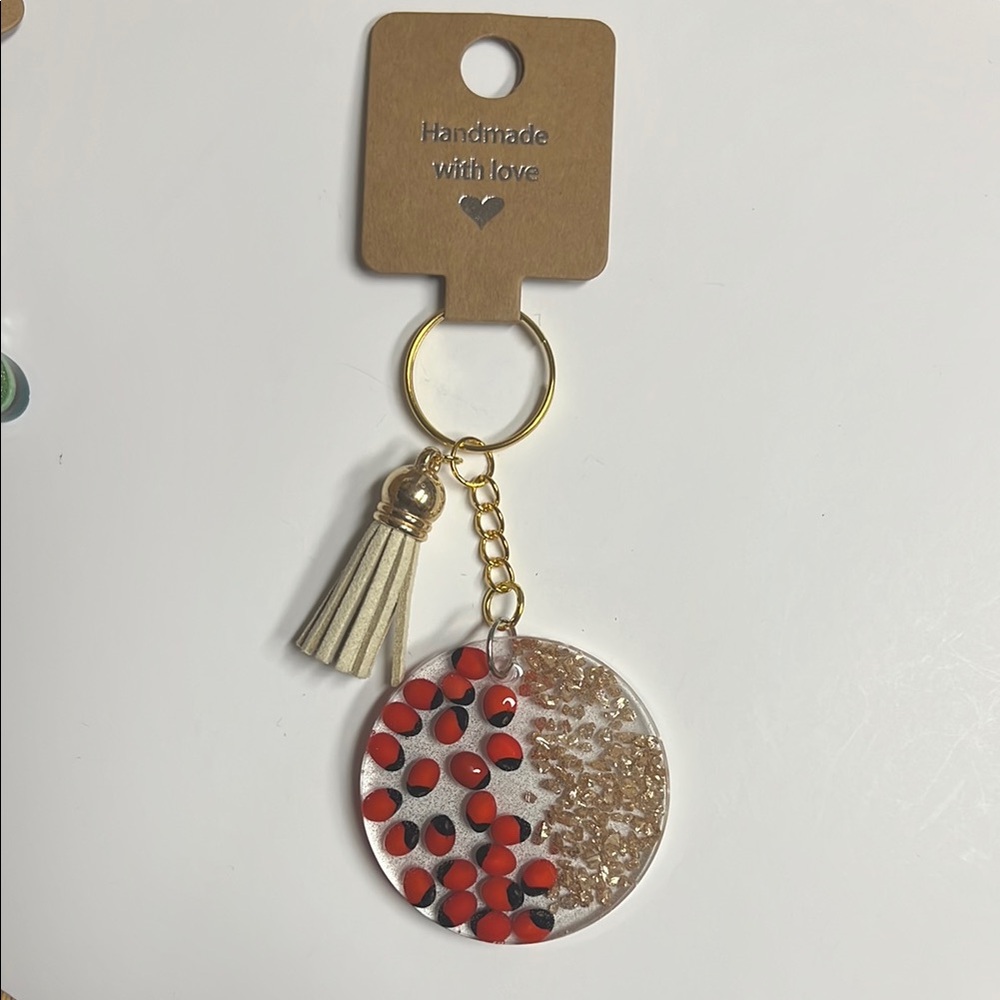 Huayruros Handmade keychains. Chakra, Luck, Protection and Prosperity